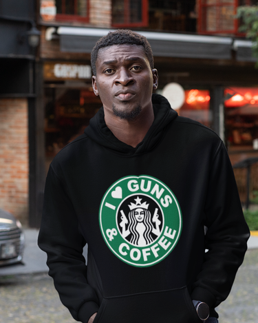 https://ilovegunsandcoffee.com/cdn/shop/files/mockup-of-a-man-wearing-a-sublimated-hoodie-in-the-city-31385m.png?v=1675943431&width=375